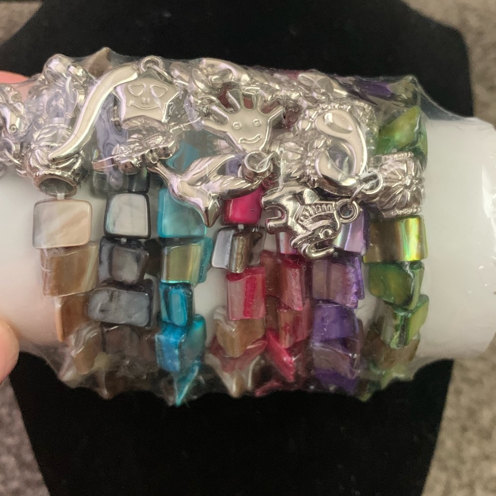 Shell charmed bracelets set